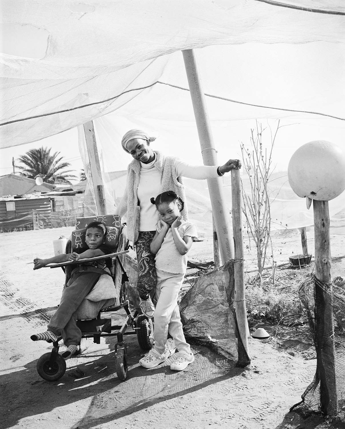  - Jo-Marie Robinson with her son, Raven, and daughter, Yu-Anne, Doringbaai, 2025