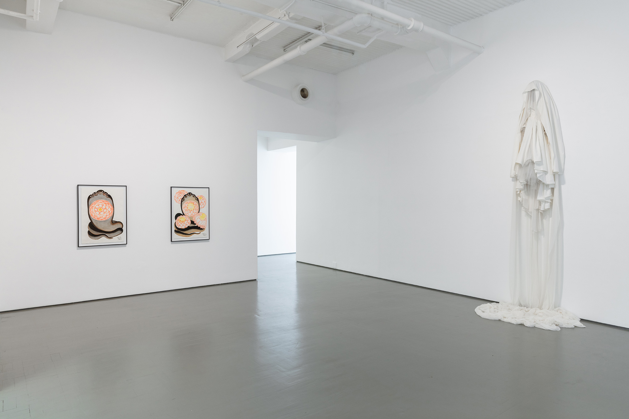 Installation view with (left) Shine Shivan, <em>Nandan</em> series; (right) Jane Alexander, <em>Attendant</em> (2008-10)