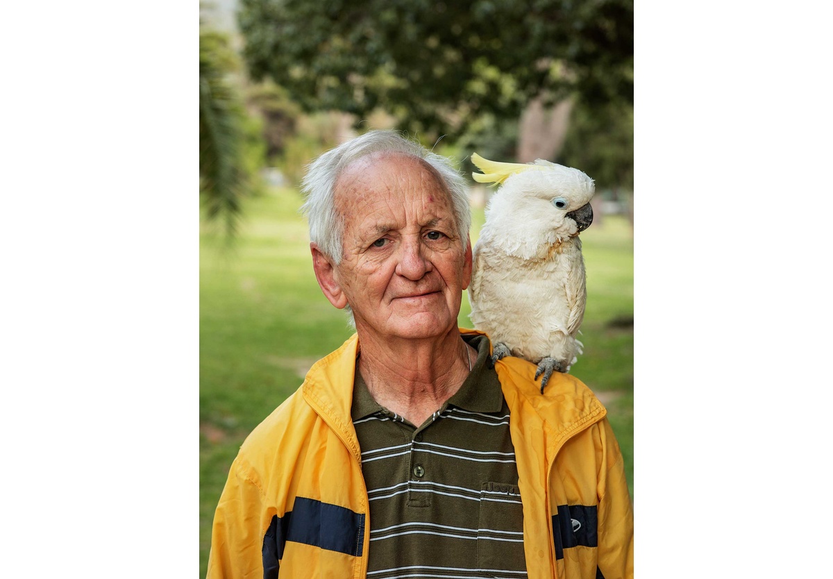 Pieter Hugo - Taking his parrot for a walk, De Waal Park, Cape Town, 2018