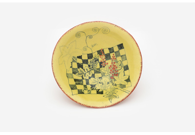 Yellow bowl with floral motifs