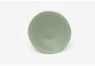 Celadon-type bowl with red foot