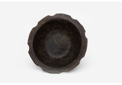 Dark marbled bowl with spiralled edge